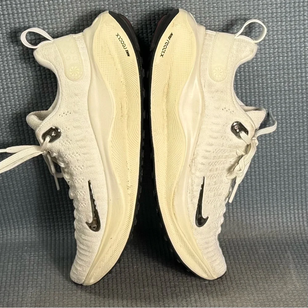 Nike Women's White Cream Running Shoes with Black Swoosh